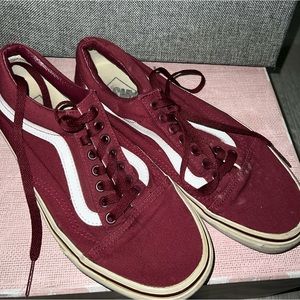 Maroon colored old skool vans
